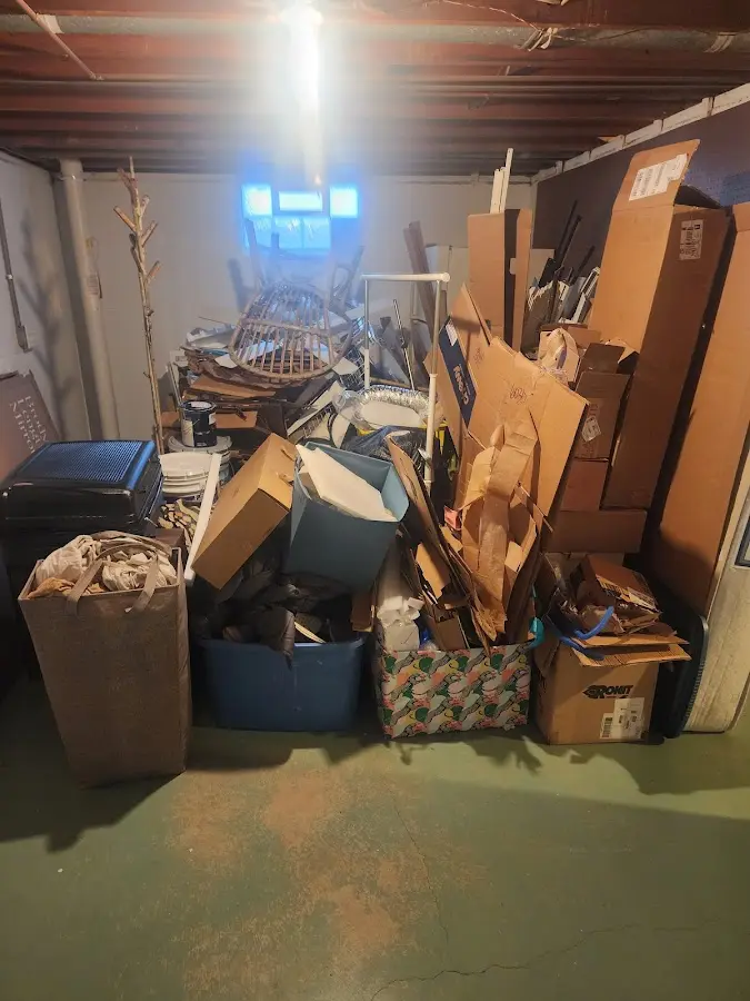 Roll-off dumpster container at job site for 2 Yard Dumpster Rental in North Mankato